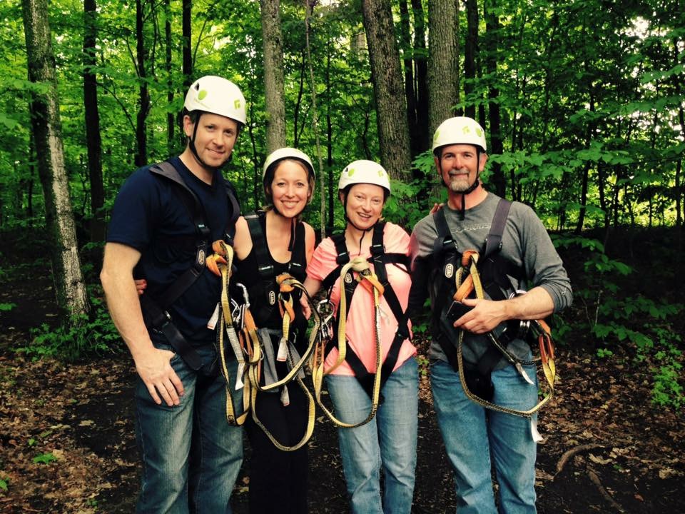 Sherry, Chris and friends wearing gear to go ziplining at Boyne Mountain in Michigan.